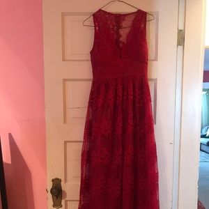 Long lace red dress with low neck line